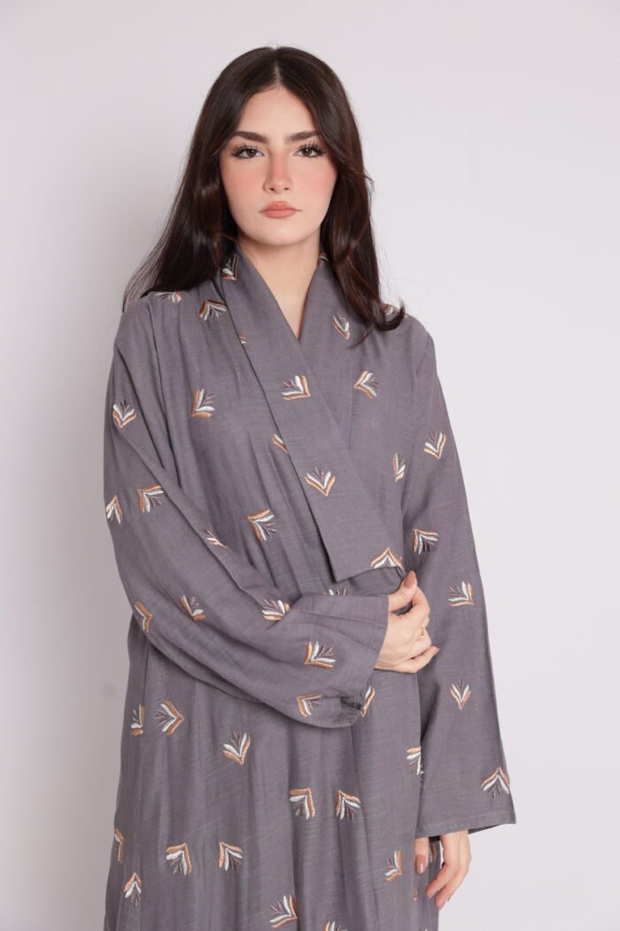 Abaya embroidered with soft geometric patterns - Image 1