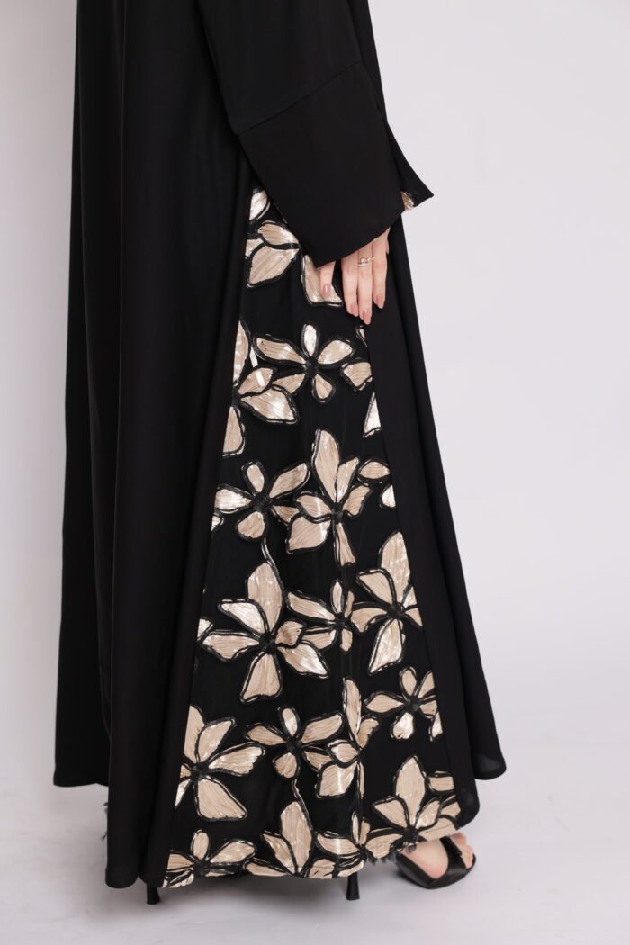 Black abaya with side embroidery and cufflinks decorated with shiny floral patterns in gold and beige - Image 5